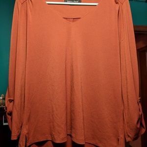 Long sleeve burnt orange blouse by Sweet Rain.